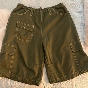 Green Jorts,they are adjustable and have many pockets